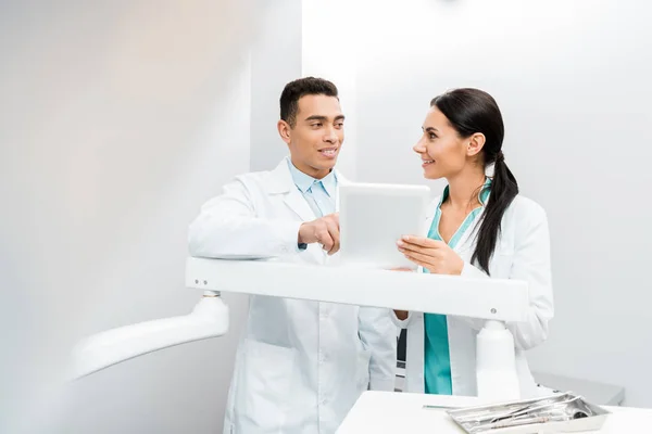 Happy Multiethnic Doctors Looking Digital Tablet — Stock Photo, Image