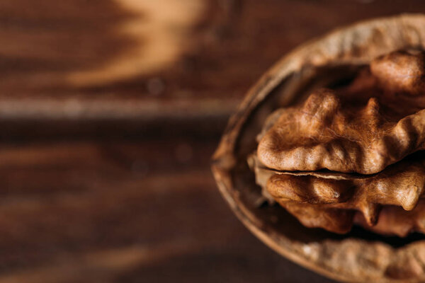 top view of walnut as dementia symbol on wooden table 