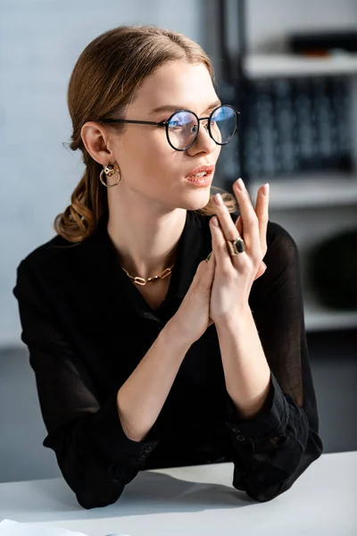 Beautiful Woman Black Clothes Glasses Sitting Chair Touching Hands — Stock Photo, Image