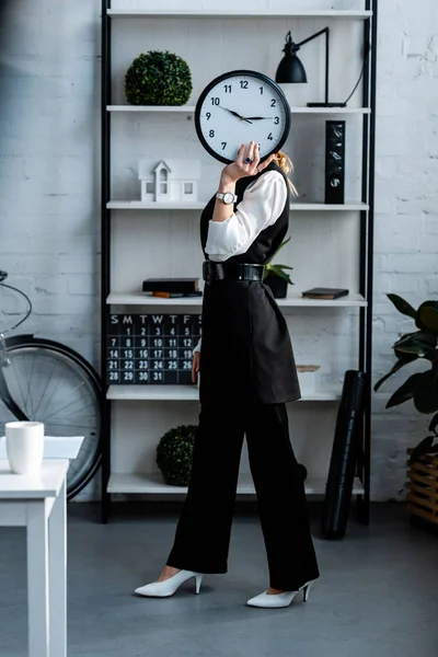 Businesswoman Formal Wear Holding Clock Front Face Workplace — Stock Photo, Image