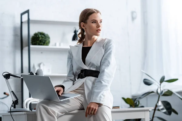 Stylish Businesswoman White Formal Wear Sitting Desk Laptop Workplace Looking — Stock Photo, Image