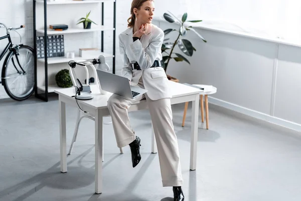 Businesswoman White Formal Wear Sitting Desk Laptop Workplace Looking Away — Stock Photo, Image