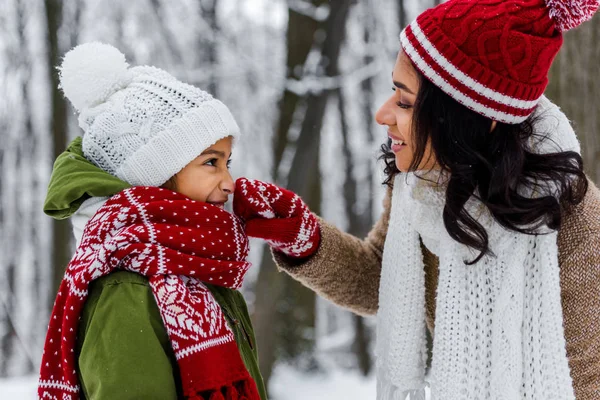 Attractive African American Woman Touching Nose Cute Preteen Daughter Winter — Stock Photo, Image