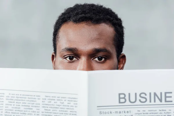 African American Casual Businessman Holding Newspaper Front Face Looking Camera — Stock Photo, Image