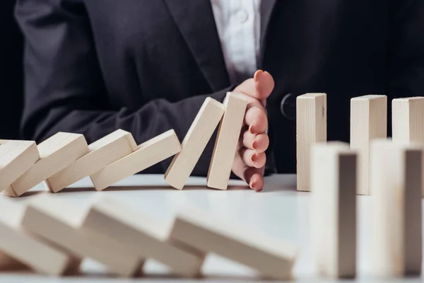 Partial View Woman Preventing Wooden Blocks Falling — Stock Photo, Image