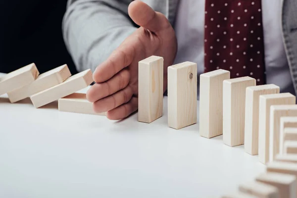 Close View Businessman Preventing Wooden Blocks Falling Copy Space — Stock Photo, Image