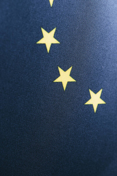blue european flag with yellow stars 