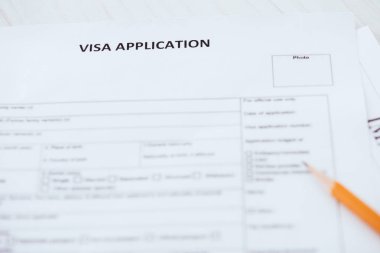 vize uygulaması yazı belge ahşap kalem yakınındaki seçici odak 