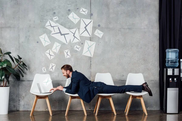 Businessman Lying Chairs Using Laptop Waiting Hall Mail Illustration Wall — Stock Photo, Image
