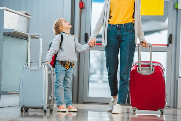 Cheerful Daughter Holding Hands Mother Departure Lounge — Stock Photo, Image