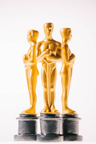 KYIV, UKRAINE - JANUARY 10, 2019: hollywood oscar award statuettes isolated on white 
