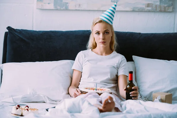 Depressed Woman Bottle Wine Cake Looking Camera While Celebrating Birthday — Stock Photo, Image