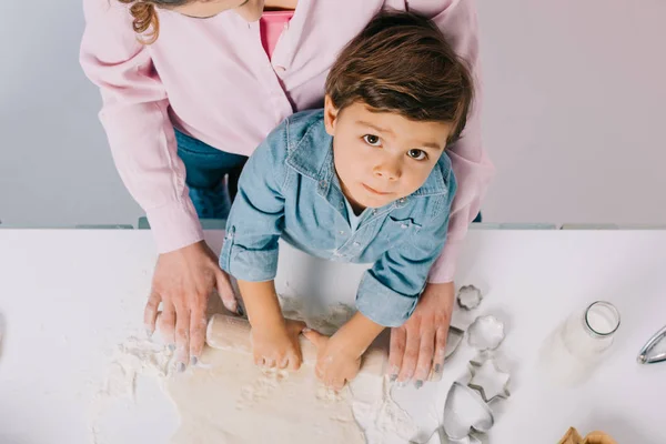 Top View Cute Little Boy Rolling Out Dough Mother Looking — Stock Photo, Image