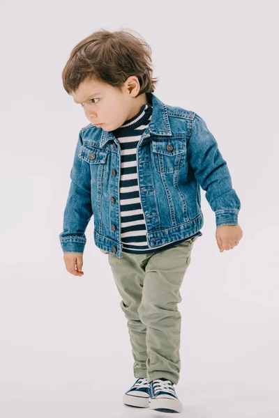 Serious Little Boy Blue Jacket Green Jeans Isolated White — Stock Photo, Image