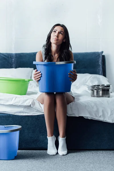 Upset Woman White Socks Holding Bucket Bedroom — Stock Photo, Image