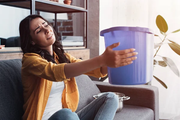 Upset Woman Holding Bucket Leaking Ceiling Living Room — Stock Photo, Image