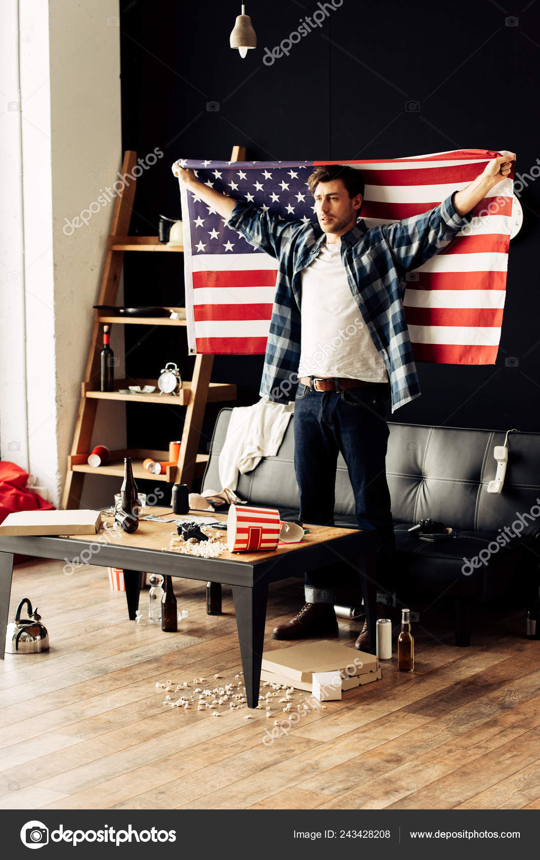 Handsome Man Holding American Flag Messy Living Room Stock