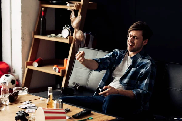 Handsome Man Gesturing While Playing Video Game Home — Stock Photo, Image