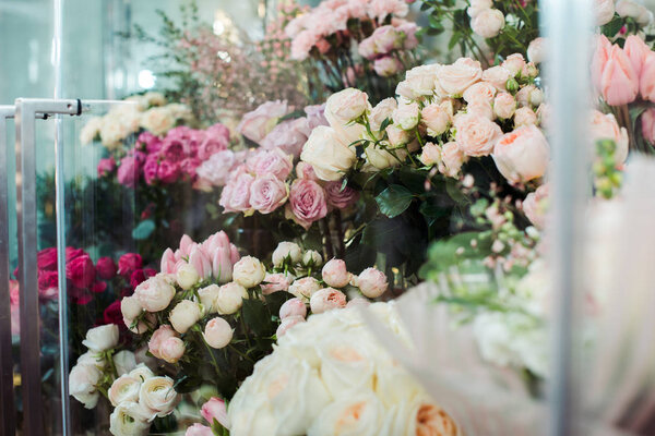 selective focus of various colorful fresh flowers in flower shop