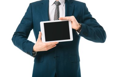 cropped view of businessman holding digital tablet with blank screen isolated on white clipart