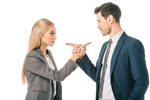 serious businesspeople pointing at each other, isolated on white