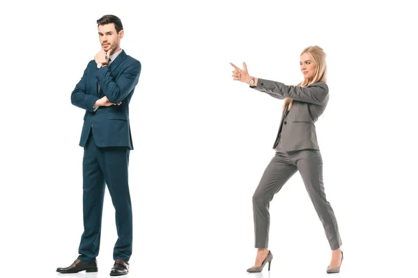 Zakenvrouw Wijzen Met Handpistool Mannelijke Collega Geïsoleerd Wit — Stockfoto