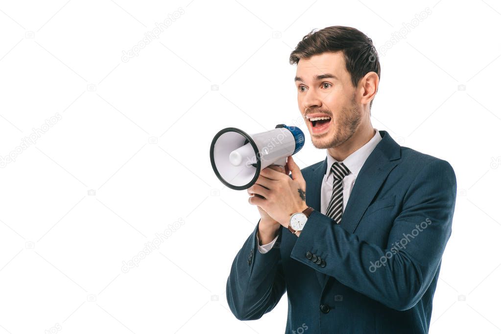 emotional businessman screaming into megaphone isolated on white