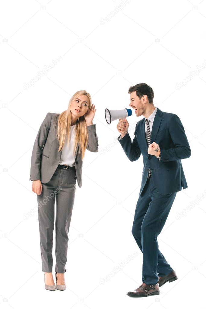 businessman yelling into megaphone at female employee isolated on white