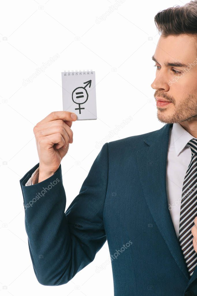 handsome businessman looking at gender equality sign, isolated on white