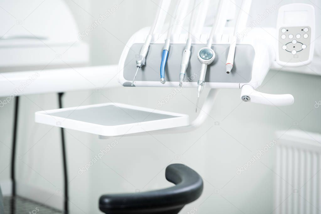 selective focus of modern dental clinic with medical equipment 
