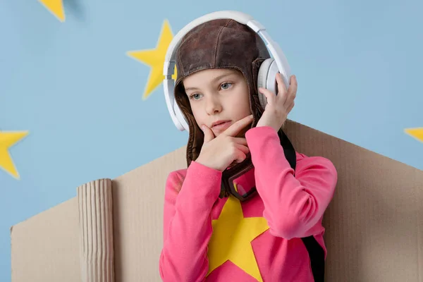 Pensive Child Flight Helmet Listening Music Blue Starry Background — Stock Photo, Image
