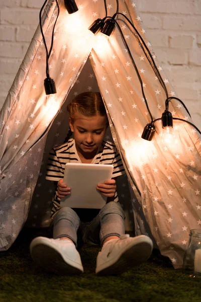 Smiling Kid Sitting Cozy Wigwam Holding Digital Tablet — Stock Photo, Image