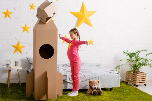 Full Length View Kid Looking Big Cardboard Rocket Waving Hands — Stock Photo, Image