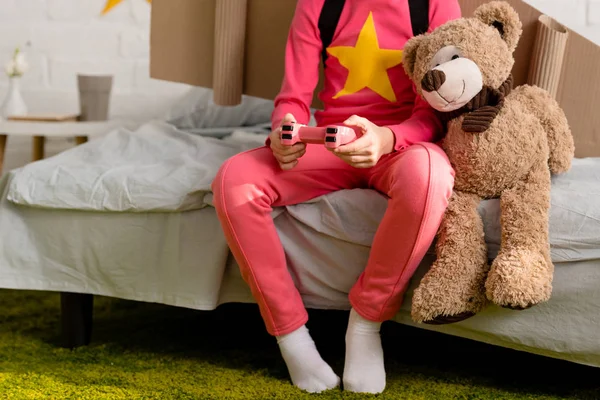 Cropped View Child Teddy Bear Holding Gamepad Bed — Stock Photo, Image
