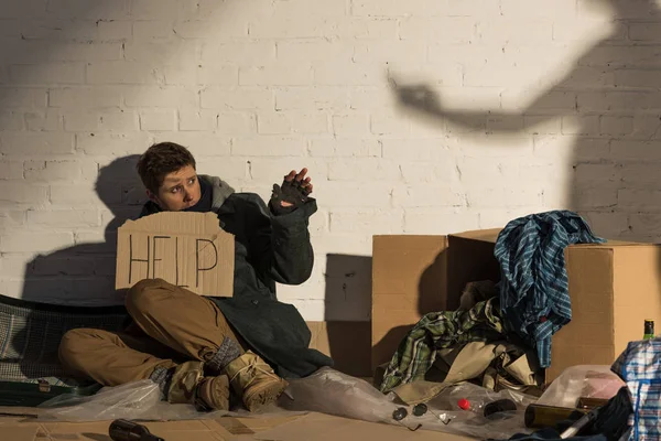 Scared Homeless Man Holding Card Help Inscription While Sitting Brick — Stock Photo, Image