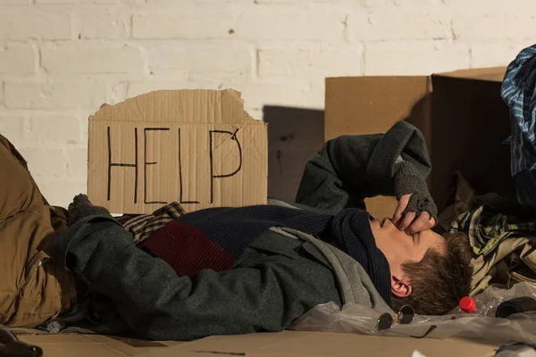 Homeless Misery Man Lying Cardboard Help Inscription Card — Stock Photo, Image