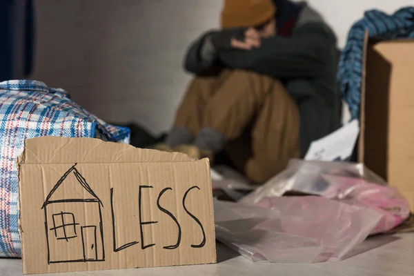 Selective Focus Homeless Man Holding Head Knees While Sitting Rubbish — Stock Photo, Image