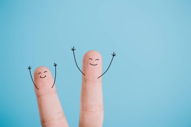 cropped view of happy excited fingers isolated on blue clipart