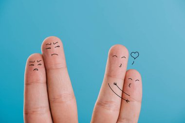 cropped view of happy and dissatisfied couples of fingers isolated on blue clipart