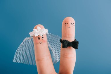 cropped view of happy wedding couple of fingers isolated on blue clipart