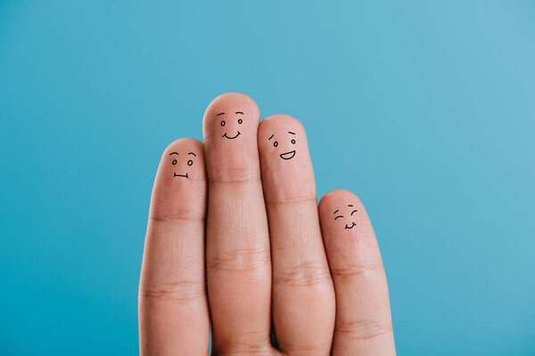 cropped view of happy fingers family isolated on blue