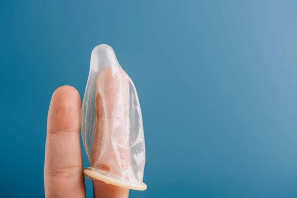 Cropped View Fingers Condom Isolated Blue Contraception Concept — Stock Photo, Image