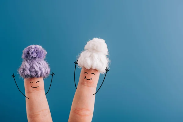Cropped View Fingers Cheerful Women Knitted Hats Isolated Blue — Stock Photo, Image