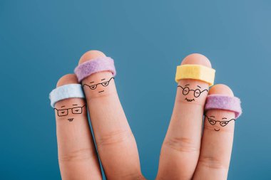 two couples of sporty fingers in eyeglasses and headbands isolated on blue clipart