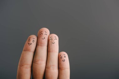 cropped view of happy human fingers isolated on grey clipart
