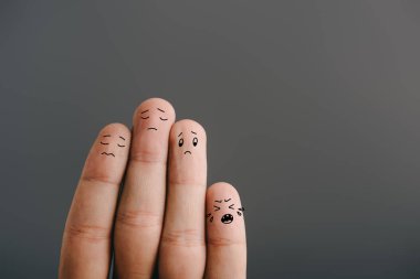 cropped view of sad fingers family with crying kid isolated on grey clipart