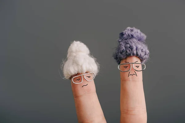 Cropped View Fingers Dissatisfied Old Women Glasses Knitted Hats Isolated — Stock Photo, Image