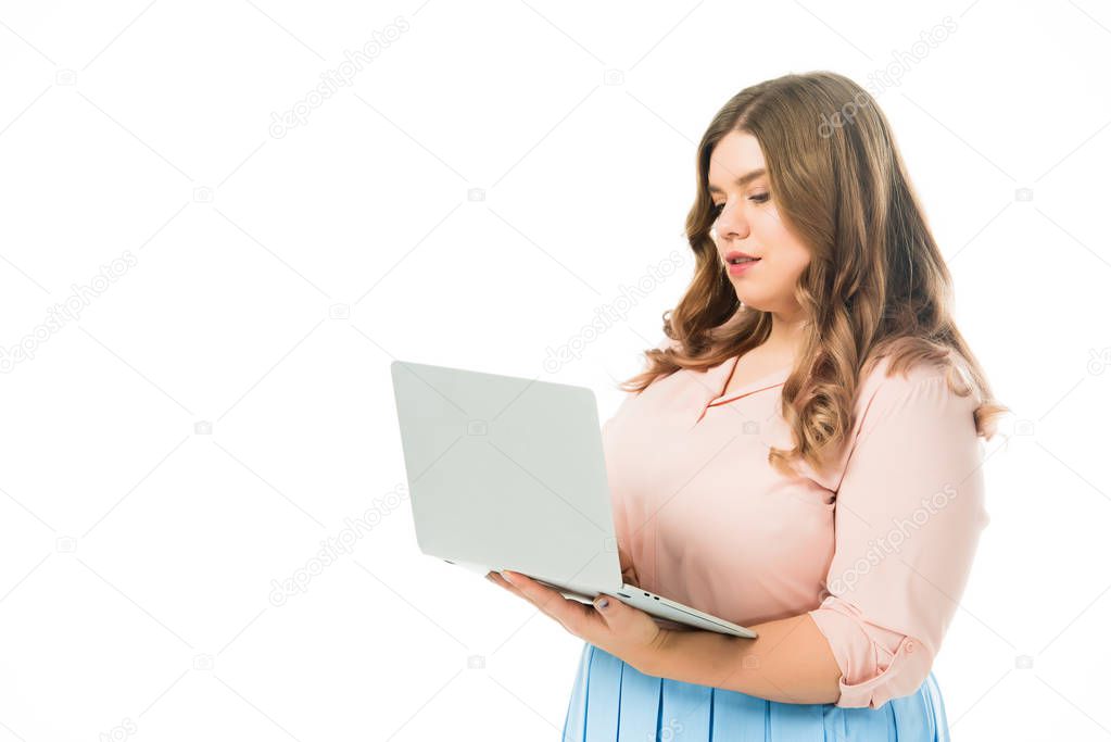 attractive plus size girl using laptop isolated on white