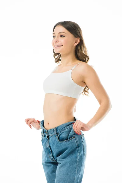 Sorrindo Jovem Magro Jeans Grandes Isolado Branco Perder Conceito Peso — Fotografia de Stock
