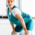 stock-photo-attractive-overweight-girl-sportswear-workouting